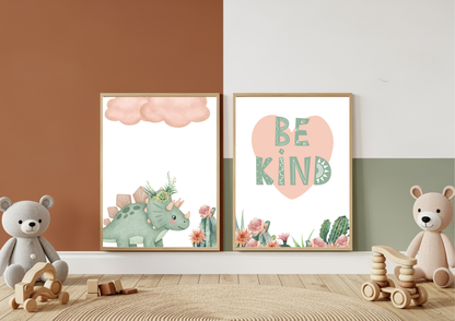 Mint Pink Dino Nursery Wall Art set featuring a triceratops and "Be Kind" quote against a terracotta and white wall.