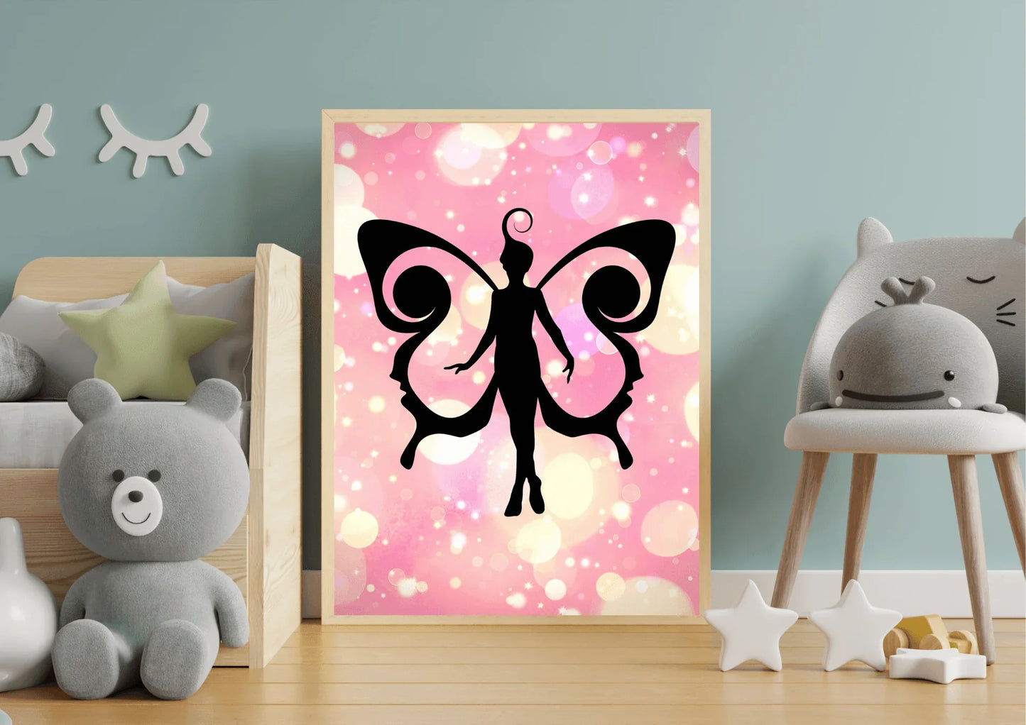 Framed artwork of a black pixy fairy silhouette on a pink background in a child's room.
