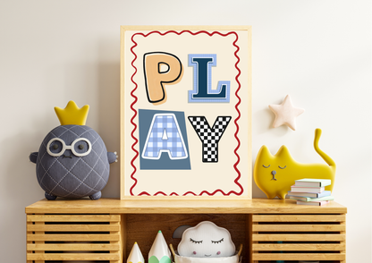 Framed 'PLAY' poster on a wooden shelf with decorative items