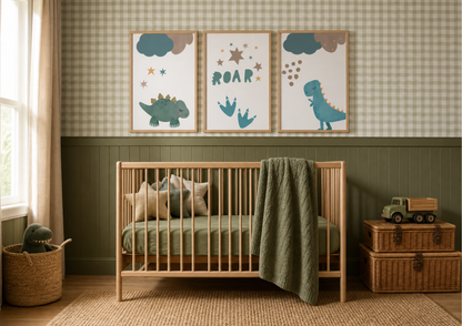 A styled nursery room featuring a wooden crib with a green quilt and bedding, a green basket with a plush dinosaur, stacked wicker storage boxes with a toy truck, and three framed dinosaur art prints on a checkered and green paneled wall.