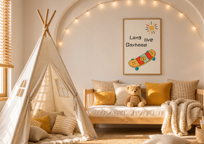 A cozy children's room corner with a cream teepee tent, a wooden daybed with mustard yellow pillows, a teddy bear, and a framed wall print that reads 'Long live Boyhood' with a skateboard graphic. Warm string lights arch over the scene.