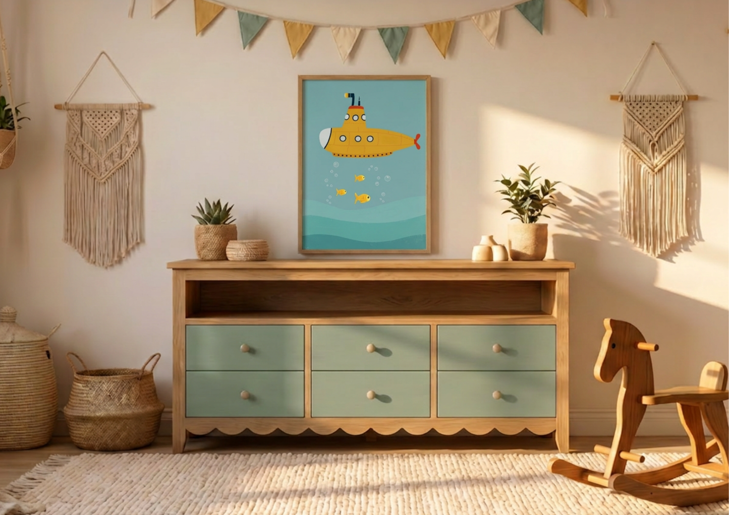 Wooden dresser with green drawers, framed picture of a yellow submarine, and decorative items in a room.