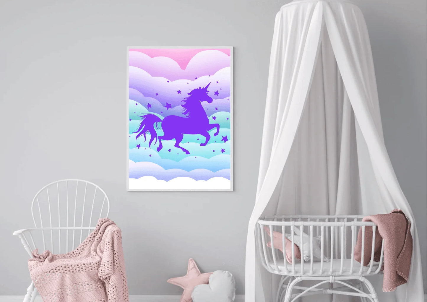 A purple unicorn silhouette wall art print hanging on a gray wall in a nursery with a crib and a rocking chair.