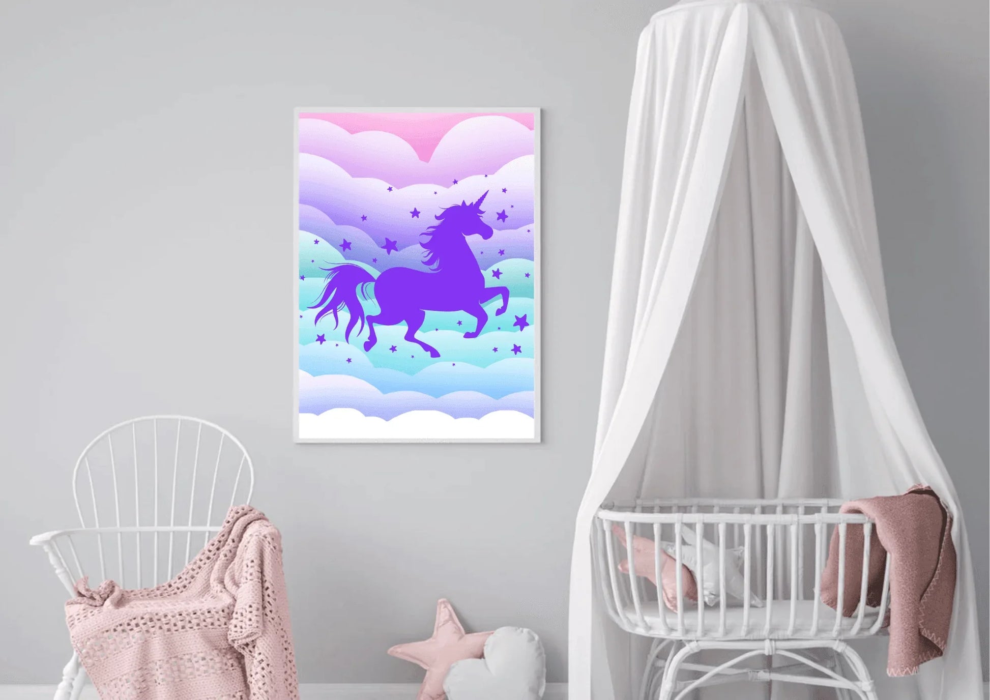 A purple unicorn silhouette wall art print hanging on a gray wall in a nursery with a crib and a rocking chair.
