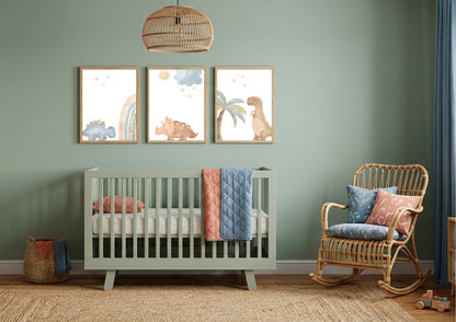 Nursery room with a crib, rocking chair, and wall art on a green wall.