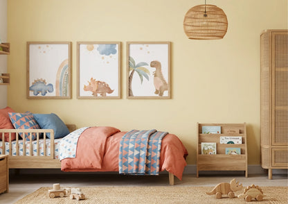 Children's bedroom with dinosaur-themed wall art and wooden furniture.