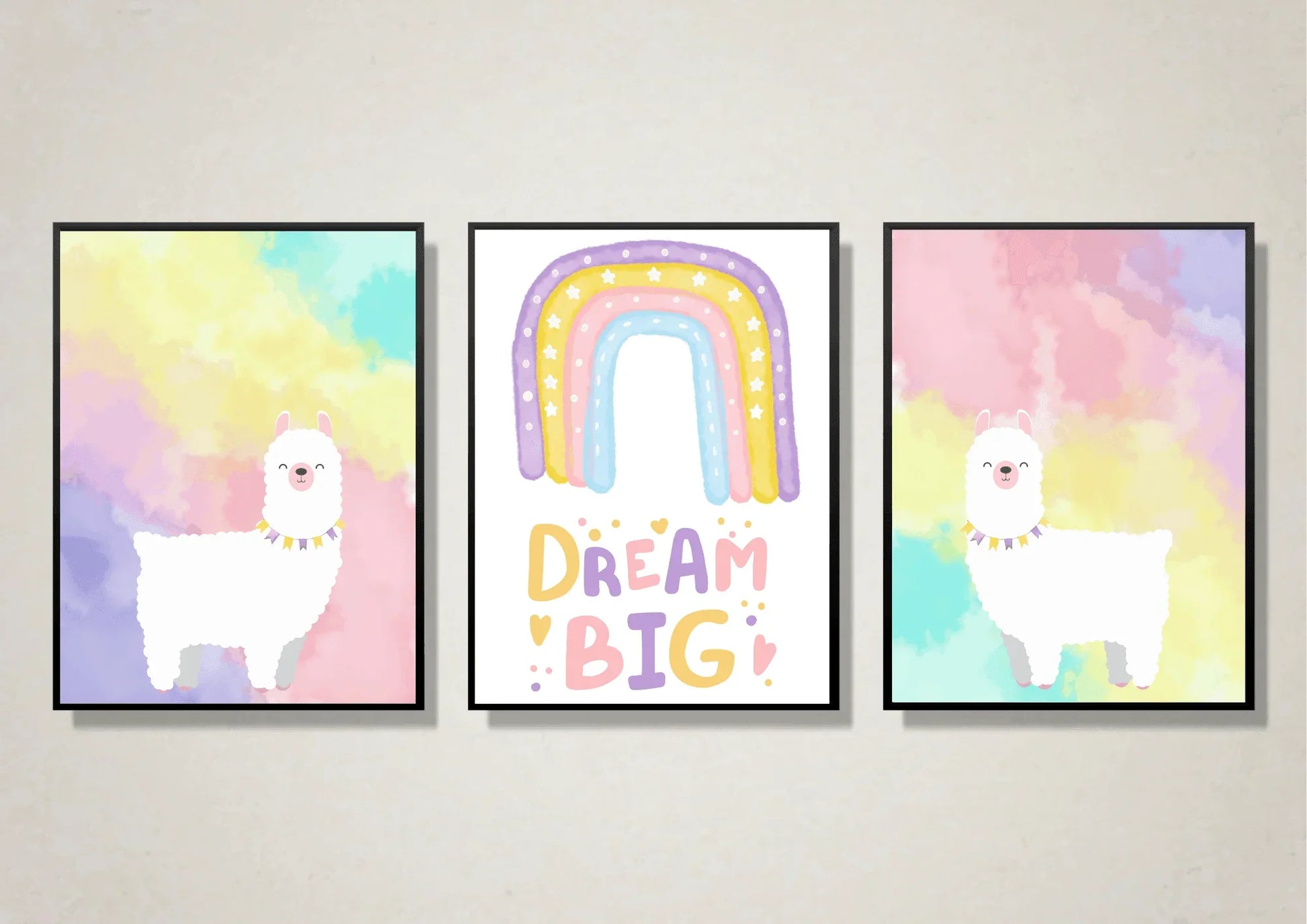A set of three whimsical llama and rainbow art prints in black frames.