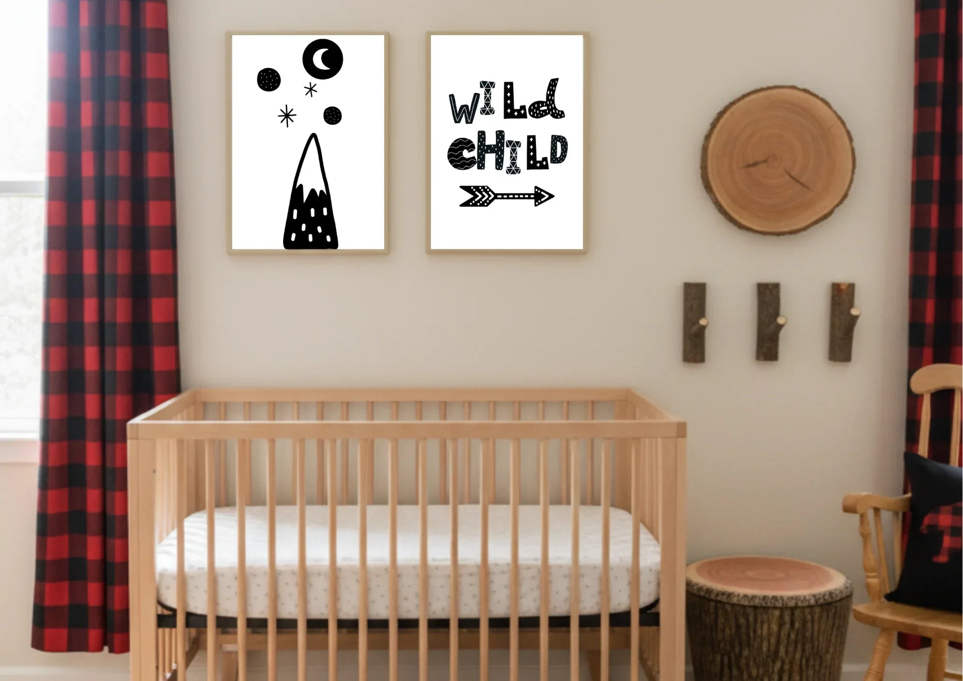 Nursery room with wooden crib, red plaid curtains, and wild child wall art.